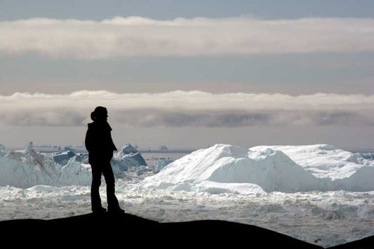 Melting model for Greenland's accelerating ribbons of ice shows 'locked-in' sea level rise